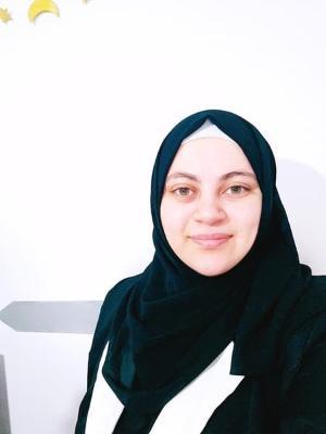 Woman in headscarf smiling