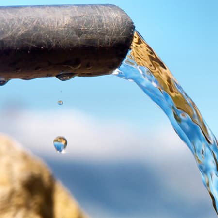 Water coming out of a pipe